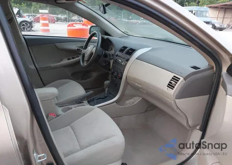 2009 Toyota Corolla Le from USA, damaged, VIN 2T1BU40E69C137608